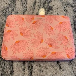 Purchased NWOT Kate Spade Falling Flower Laptop Zip Pouch Case, used it twice.